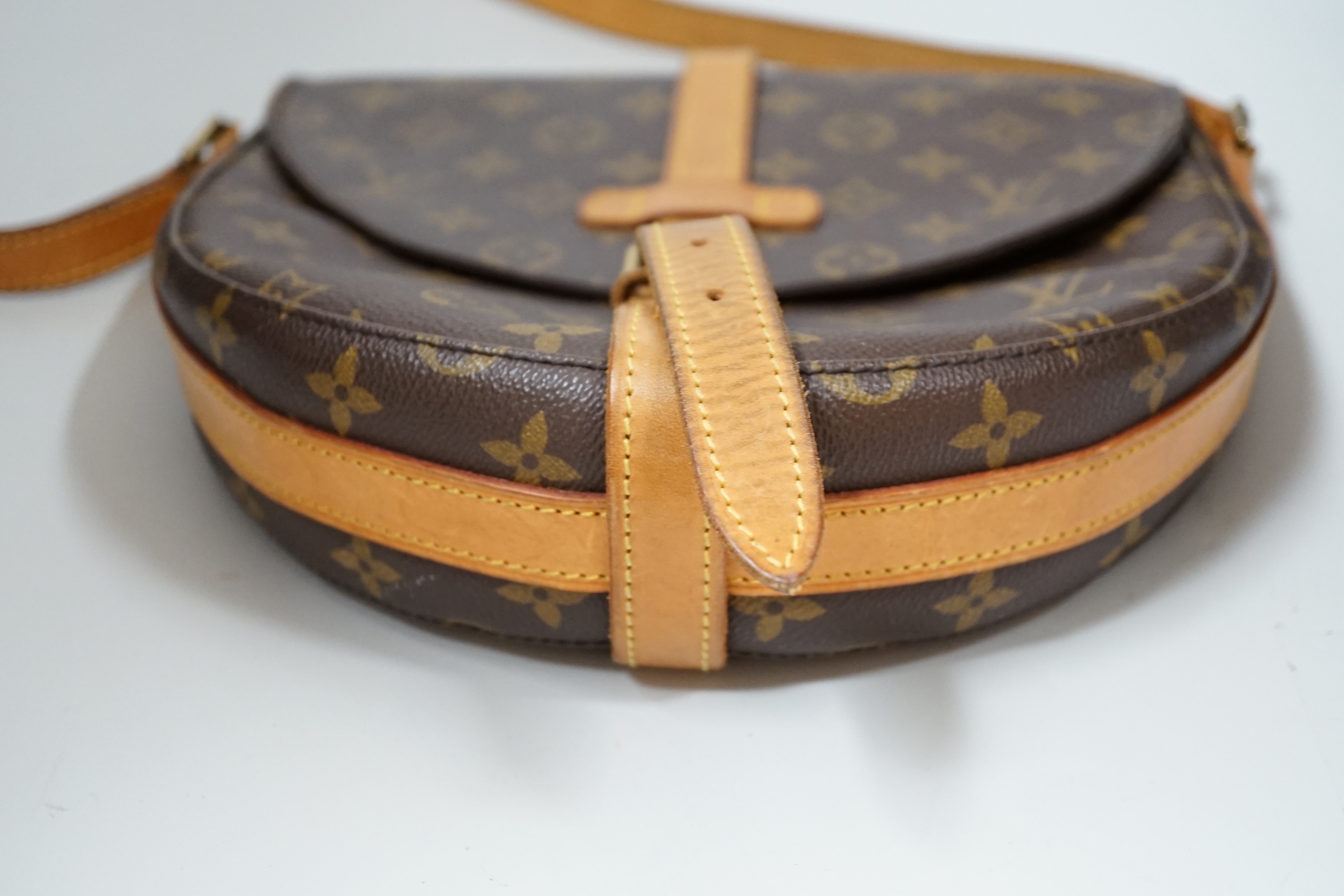 A Louis Vuitton lady’s handbag, horseshoe shaped, 28cm wide